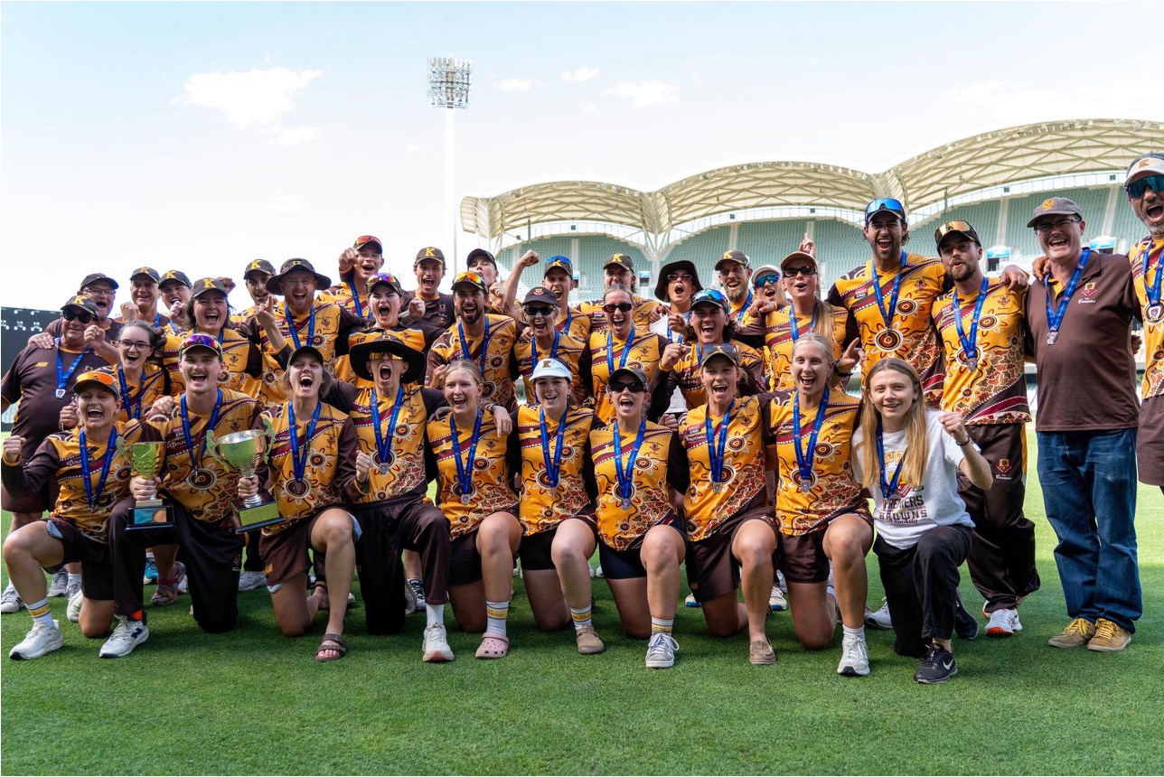 Season 2025-26 Men's and Women's 1st Grade Teams and Women's 2nd Grade Team celebrating their T20 Premiership wins on Adelaide Oval. Some players are kneeling in the front row, others standing behind with coaches.